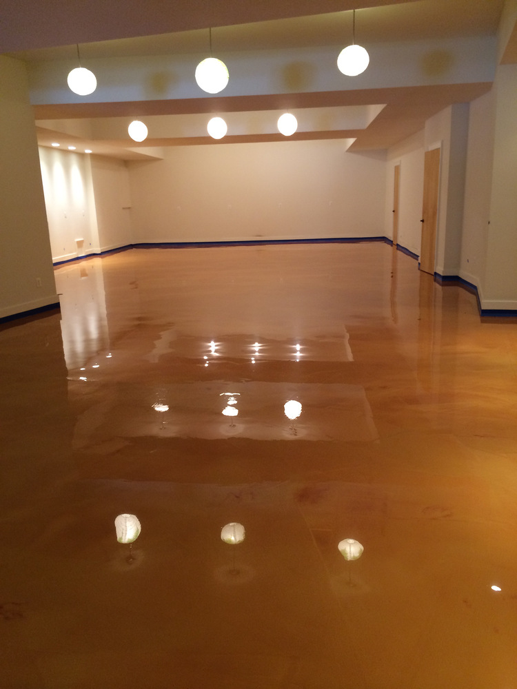 metallic epoxy floor coating with big light bulbs